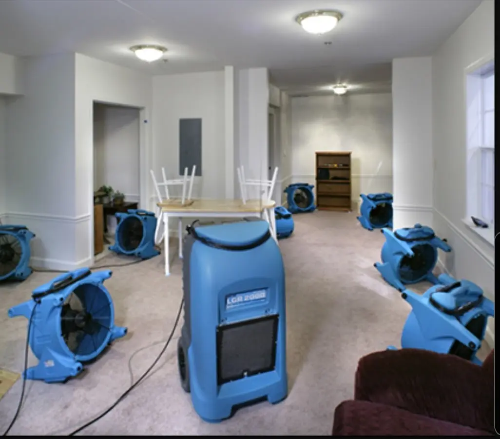 Air movers and dehumidifier setup for Water Damage Restoration in Brecknock